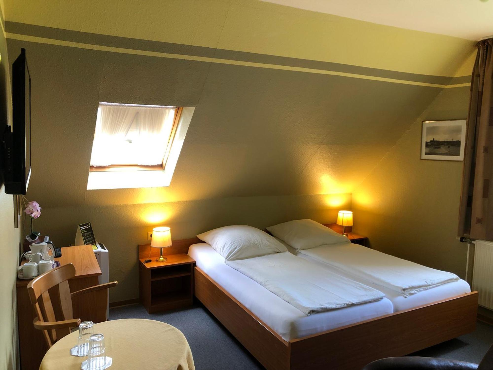 Garni Hotel-Pension Holum Neuharlingersiel Eksteriør billede