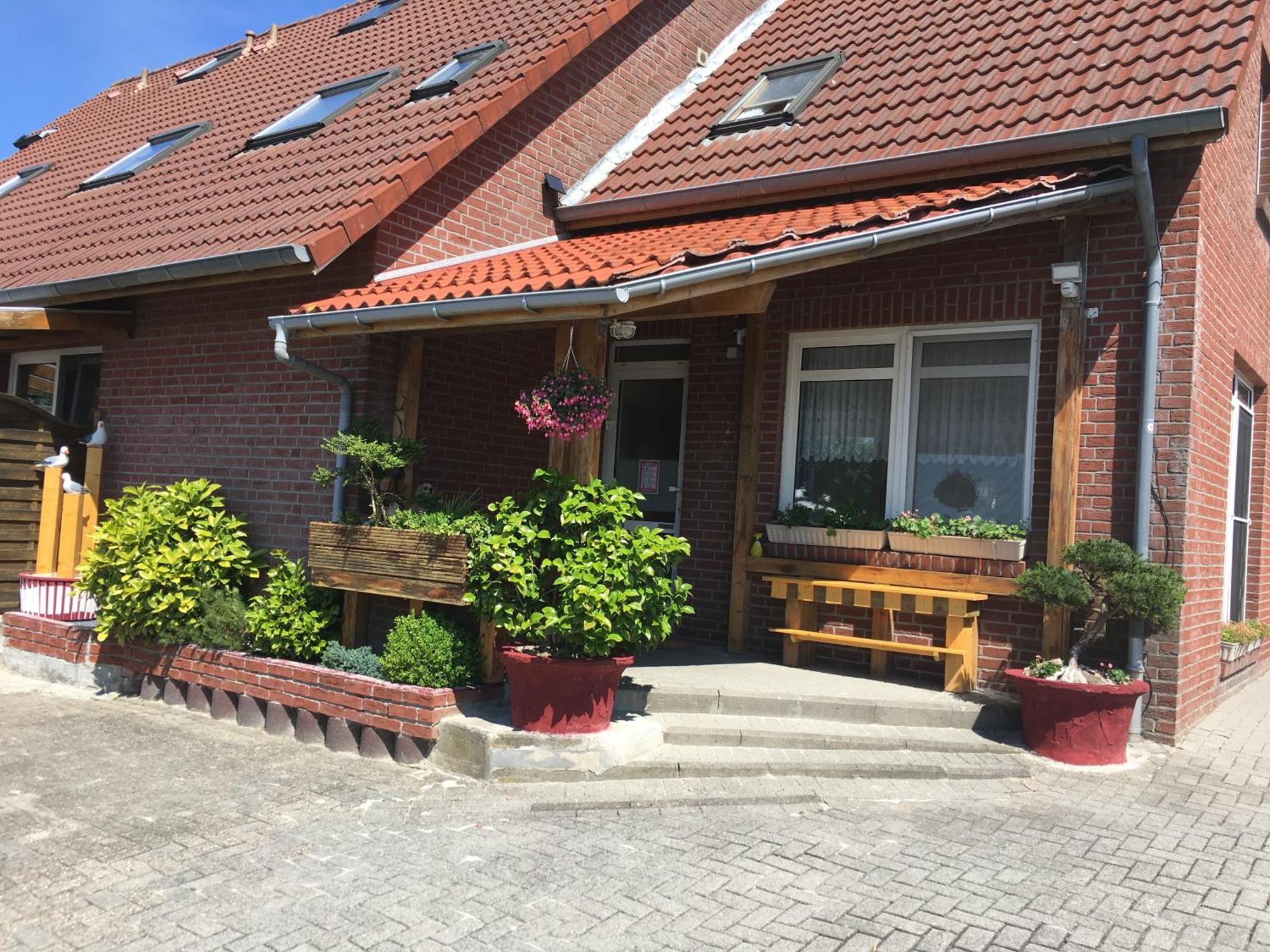 Garni Hotel-Pension Holum Neuharlingersiel Eksteriør billede